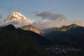 Mount Kazbek and Gergeti Trinity church in sunrise light Royalty Free Stock Photo