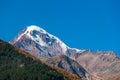 Mount Kazbek Mkinvartsveri at sunny day. Caucasus mountains Royalty Free Stock Photo