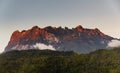 Mount Kinabalu shining golden at sunsets Royalty Free Stock Photo