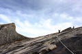 Mount Kinabalu summit with hikers in silhouette Royalty Free Stock Photo