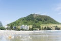 Mount Maunganui and beach foreground in summer.