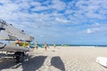 Members Mount Maunganui Surf Lifesavers club head down beach Royalty Free Stock Photo