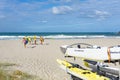 Members Mount Maunganui Surf Lifesavers club head down beach Royalty Free Stock Photo