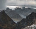 Mount Munken above fjords under a stormy sky on the Lofoten Islands in Polar Norway Royalty Free Stock Photo