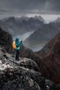 Mount Munken to fjord under a stormy sky Royalty Free Stock Photo