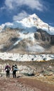 Mount Nuptse, mount Everest base camp and two toutists