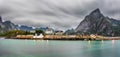 Mount Olstind above the Sakrisoy fishing village, Lofoten, Norw Royalty Free Stock Photo