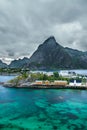 Mount Olstind above the Sakrisoy fishing village, Lofoten Royalty Free Stock Photo