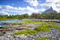 Mount Otemanu through turquoise lagoon and vegetation. Honeymoon Royalty Free Stock Photo