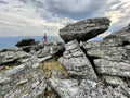 Mount Otorten, Northern Ural, Russia, July, 09, 2021.Tourist climbs the top of Mount Otorten 1234 meters. Russia, Northern Ural