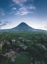 Mount Pico Mountain Aerial Drone image with volcano western slope viewed from ocean with summit Piquinho after sunset