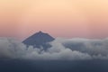 Mount Pico , Ponta do Pico with clouds layer as seen from SÃÂ£o Jorge Island Royalty Free Stock Photo