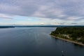 Mount Rainier on the horizon from above the Puget Sound at Nisqually Reach in June of 2022 Royalty Free Stock Photo