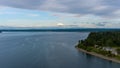 Mount Rainier on the horizon from above the Puget Sound at Nisqually Reach in June of 2022 Royalty Free Stock Photo