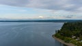Mount Rainier on the horizon from above the Puget Sound at Nisqually Reach in June of 2022 Royalty Free Stock Photo