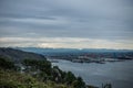 Mount Rainier Topped With Clouds With The Port Of Tacoma Below Royalty Free Stock Photo