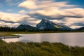 Mount Rundle in Vermillion lake with wooden pier on sunset at Banff national park Royalty Free Stock Photo