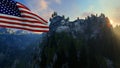 Mount Rushmore with USA Flag blowing in the wind against blue sky