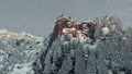 Mount Rushmore in winter, snowing
