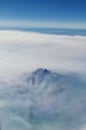 Mount Shasta aerial view from airplane, Northern California Cascade Range fog smoke from wildfires, forest fires. Siskiyou County,