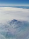 Mount Shasta aerial view from airplane, Northern California Cascade Range fog smoke from wildfires, forest fires. Siskiyou County,