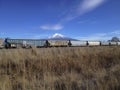 Mount Shasta Over Railcars Royalty Free Stock Photo