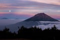 Mount Sumbing range lighted by moon in summer at evening Royalty Free Stock Photo