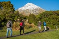 Tourist prepare for hiking in Taranaki Egmont national park of New Zealand. Royalty Free Stock Photo