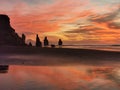 Mount Taranaki and Three Little Sister Rocks in New Zealand. WEST COAST, North Island