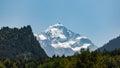 Mount Tetnuldi rises above the Great Caucasian Range in the upper Svaneti in Georgia, Mountain Landscape Royalty Free Stock Photo