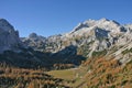 Mount Triglav in autumn sunshine with larches Royalty Free Stock Photo