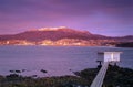 Mount Wellington with snow and the city of Hobart from across the Derwent River Royalty Free Stock Photo