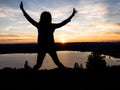 Mount Zugerberg stunning beautiful sunset silhouette happy person jumping lake zug Royalty Free Stock Photo