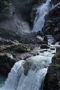 Mountail waterfall. Rocky high mountain setting