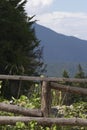 Delimitation wood fence at the edge of a cliff