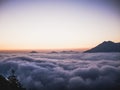 Mountain above the clouds, sunset time