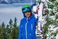 Mountain adventure: young boy stand in ski helmet and goggles Royalty Free Stock Photo