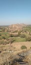 Mountain and agreecltior land in village in India trees green fild