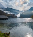 Mountain alpine autumn misty morning lake Konigssee, Schonau am Konigssee, Berchtesgaden national park, Bavaria, Germany Royalty Free Stock Photo