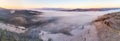 Mountain autumn misty Sunrise panorama. Majestic Morning fog, November Valley Aerial scene. Ice, frost on grass. Fall sunny Royalty Free Stock Photo