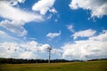 Mountain background with chair ski lift, green forest, blue sky, empty space Royalty Free Stock Photo