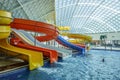 The Mountain Beach Water Park in Gorky Gorod resort. Interior view of water pool and water hill attractions. Royalty Free Stock Photo