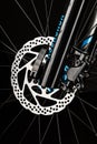 mountain bicycle disk brake system on dark background Royalty Free Stock Photo