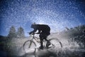 Mountain Bicyclist Splashing Through Water