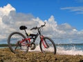 Mountain-bike on beach Royalty Free Stock Photo