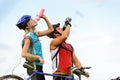 Mountain bike couple drinking Royalty Free Stock Photo