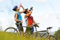 Mountain bike couple drinking Royalty Free Stock Photo