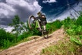 Mountain bike cyclist doing wheelie stunt on a mtb bike