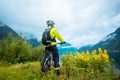 Mountain bike cyclist near fjord, Norway Royalty Free Stock Photo