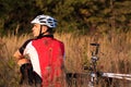 Mountain Bike cyclist resting outdoor with his bike Royalty Free Stock Photo
